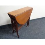 An Edwardian mahogany Sutherland table