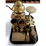 A tray containing assorted brass wares to include trivet teapots, tankards, ornaments,