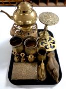 A tray containing assorted brass wares to include trivet teapots, tankards, ornaments,