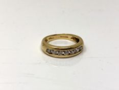 A 14ct gold cubic zirconia half eternity ring, size O. CONDITION REPORT: 4.