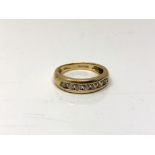 A 14ct gold cubic zirconia half eternity ring, size O. CONDITION REPORT: 4.