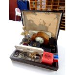 An inlaid mahogany mantel clock (battery operated) together with an oak canteen containing dimple