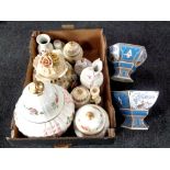 A box containing assorted ceramics to include Japanese style lidded vases and comports,