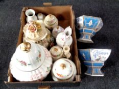 A box containing assorted ceramics to include Japanese style lidded vases and comports,