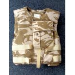 A desert pattern body armour vest