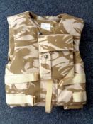 A desert pattern body armour vest