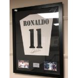 A sporting memorabilia montage : Ronaldo, facsimile signed ,