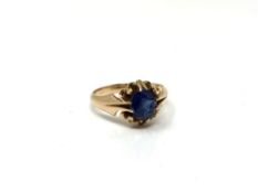 A gold sapphire solitaire ring, size N. CONDITION REPORT: Unmarked, 4.2g.