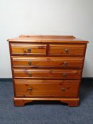 A Ducal pine five drawer chest together with a Ducal pine double door cupboard