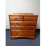 A Ducal pine five drawer chest together with a Ducal pine double door cupboard