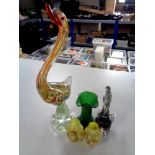 Five pieces of glassware to include two Venetian glass bird ornaments,