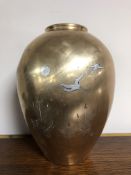 A Japanese Meiji period bronze and silver inlaid vase depicting cranes in flight,