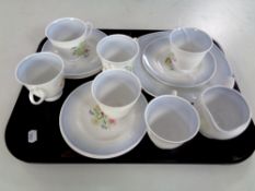 A tray containing 13 pieces of Susie Cooper bone tea china