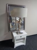 A contemporary bedside table fitted a drawer together with a silver framed mirror and a wooden