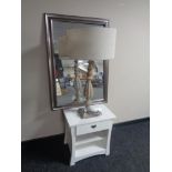 A contemporary bedside table fitted a drawer together with a silver framed mirror and a wooden