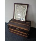 An early 20th century wooden bound dome topped Drawco trunk together with a framed map of