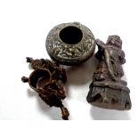 A tub containing an eastern bronze miniature bowl,