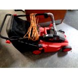 A Estore electric lawn mower with grass box and lead