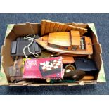 A box containing miscellaneous to include wooden boat, xylophone, brass ashtray and pipe stand,