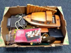 A box containing miscellaneous to include wooden boat, xylophone, brass ashtray and pipe stand,