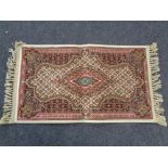 A Persian silk finished fringed prayer rug
