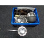 A box containing assorted aluminium pans, Pyrex dish, cooking utensils,