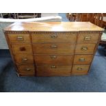 A George III inlaid mahogany break front four drawer chest (as found)