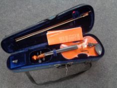 An Antoni violin and bow in case