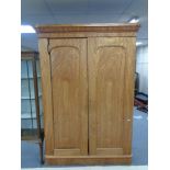 A Victorian satinwood double door wardrobe, fitted internal trays and drawers (as found).