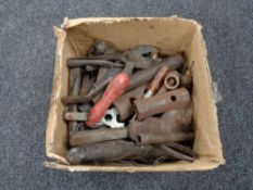 A small box containing vintage hand tools,