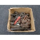 A small box containing vintage hand tools,