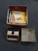 A vintage Lilliput typewriter together with a box containing a large quantity of sheet music