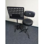 An adjustable music chair together with an adjustable music stand