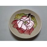 A Moorcroft Pink Magnolia pin dish, width 11.