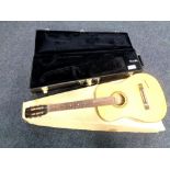 A Conn trumpet case together with a Musima acoustic guitar in box