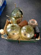 A box containing two etched glass hurricane table lamps, shaving mirror, Kilner jar,