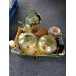 A box containing two etched glass hurricane table lamps, shaving mirror, Kilner jar,