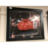 A sporting memorabilia montage : A signed red Everlast boxing glove, Steve Collins,