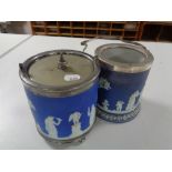 Two Wedgwood Jasperware silver rimmed biscuit barrels (one missing lid)