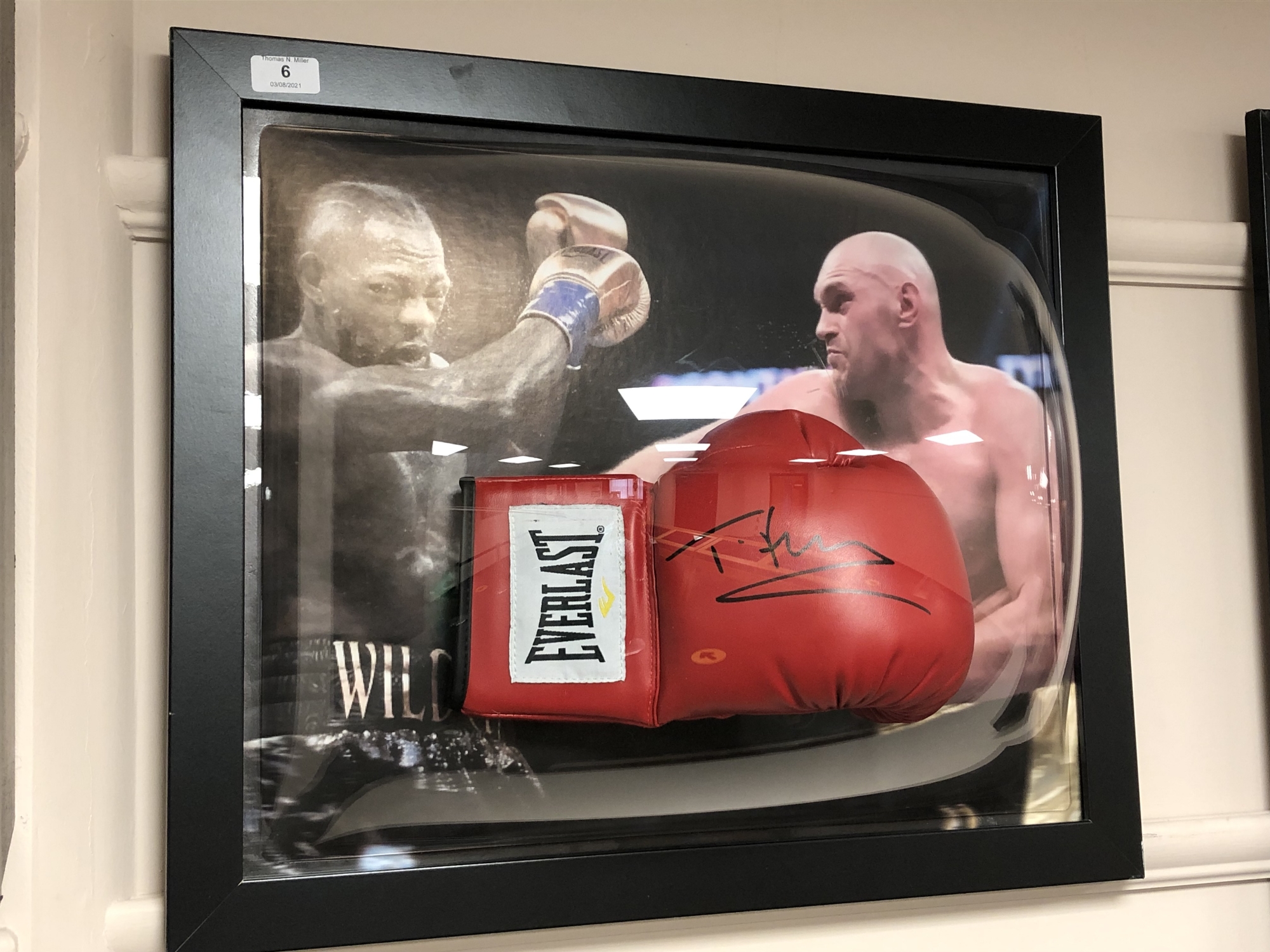 A sporting memorabilia montage : A signed red Everlast boxing glove, Tyson Fury ,