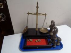 A set of antique brass chemist's scales together with small quantity of weights and a further set