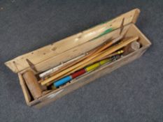 A Jacques croquet set in a pine box (lid a/f)