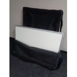 Two sets of presentation boards in carry bags