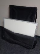 Two sets of presentation boards in carry bags