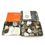 Two vintage tins containing a collection of old coins, including; George III and later pennies,