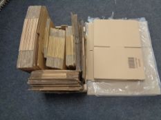 A large quantity of flat packed boxes