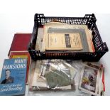 A box containing miscellaneous to include postcards, books, London picture album,
