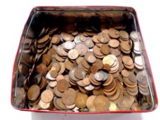 A tin containing a large quantity of pre decimal copper coinage