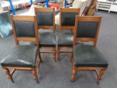 A set of four Edwardian oak armchairs