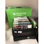 An XBox One box (empty) together with an XBox 360,